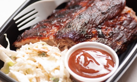 Glazed pork ribs with horseradish apple slaw grilling on the fourth of july