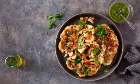 Grilled cauliflower steaks and scallions fall grilling series