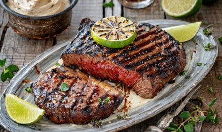 Grilled chipotle rubbed steaks with lime butter celebrate fathers day outdoors