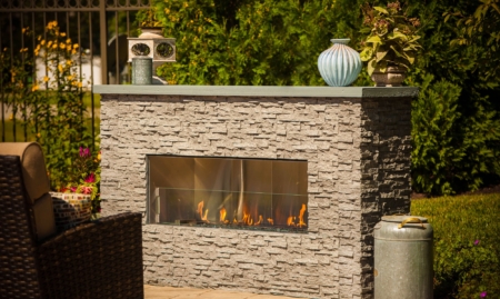 Why an outdoor gas fireplace is a smart investment