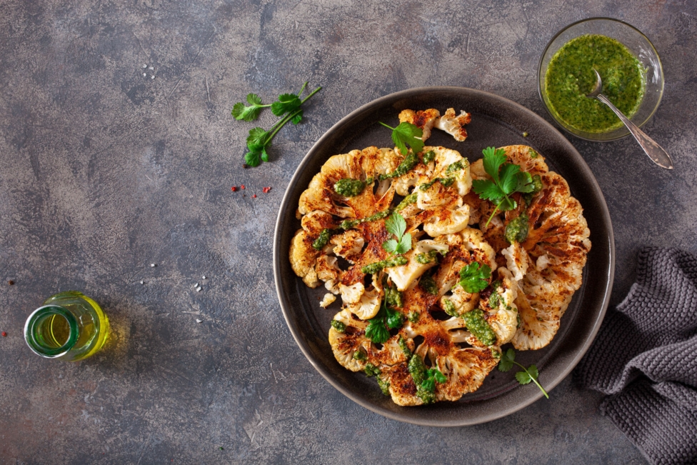 Grilled cauliflower steaks and scallions fall grilling series